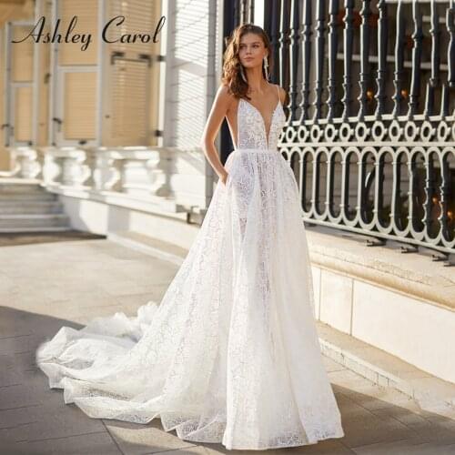 Ashley Carol A-Line Wedding Dress 2021 Delicate Beaded Lace Appliques V-Neck Bride Spaghetti Straps Backless Beach Bridal Gown