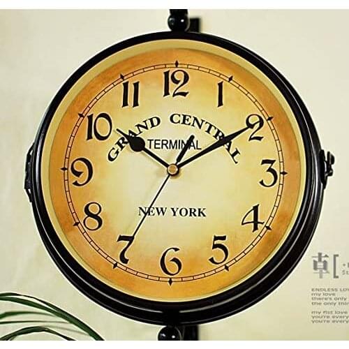 Vintage iron double dial wall clock