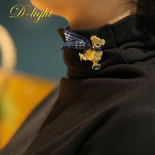 Tandsen Brooches