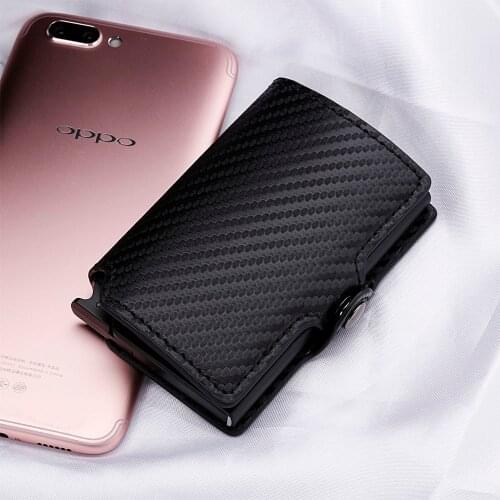 Casekey Mini Anti-theft Carbon Fiber Slim Wallet with Metallic Pop Up RFID Credit Card Holder