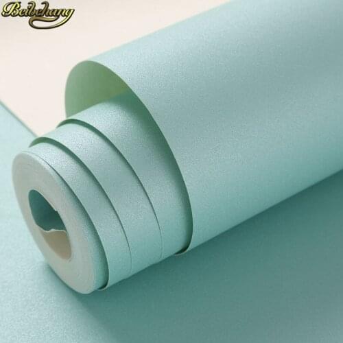 Beibehang Modern Solid color smooth simple wallpaper living room clothing store hotel beauty salon plain red purple wallpaper 3D