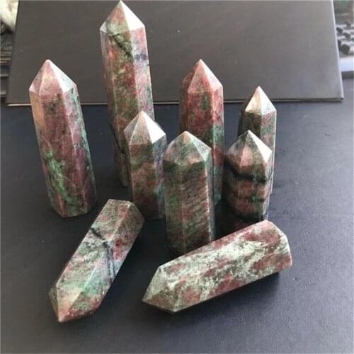 Natural red and green gemstones polished towers epidote crystals quartz wand points