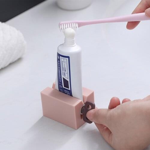 New Bathroom Accessories Toothpaste Squeezer Tooth Paste Dispenser Tube Squeezer Facial Cleanser Press Rolling Holder for Kids