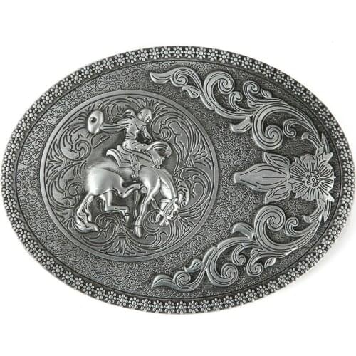 Western cowboy with bull riders carved buckle
