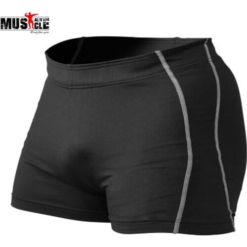 2019 Gyms Shorts Mens Bodybuilding Muscle Clothing Shorts Polyester Spandex Solid Skinny Shorts Body Black Orange Fitness Shorts