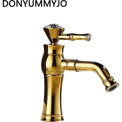 DONYUMMYJO Beautiful Deck Mounted Single Handle Counter top Basin Faucet Antique Brass Hot and Cold Water Bathroom Mixer Taps