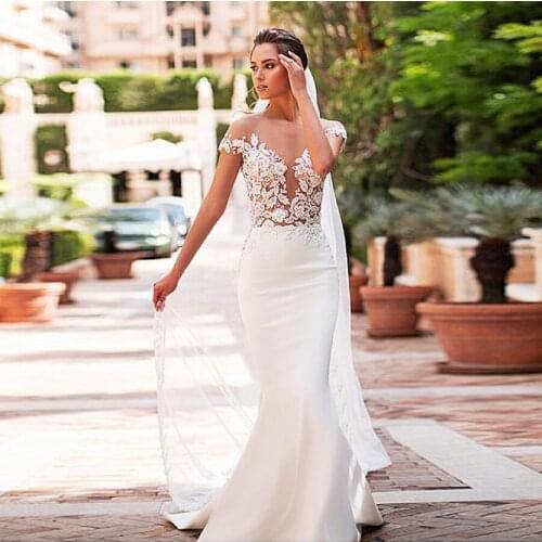 Exquisite Sheer Nude Tulle Mermaid Wedding Dresses Cap Sleeves Lace applique Sexy See Through Bridal Dress