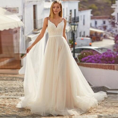 Sexy Wedding Dresses Tulle Appliques Pleat V-Neck Sleeveless Backless Ball Bridal Gowns Novia Do 2021 New