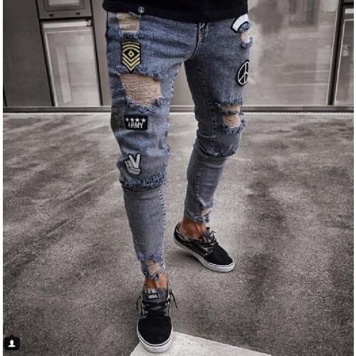 European and American small foot badge jeans mens fashion knee hole zipper small foot hole denim trousers