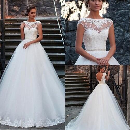 2020 Classic Jewel Neck Backless Wedding Dresses Appliques Illusion Tulle Bridal Dresses Robe De Mariee