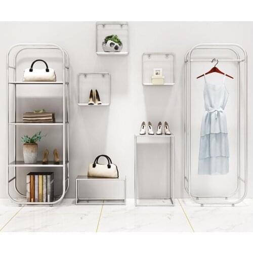 Clothing store display shelf floor-type window creative flowing water platform net red womens clothing store shoes bag shelf