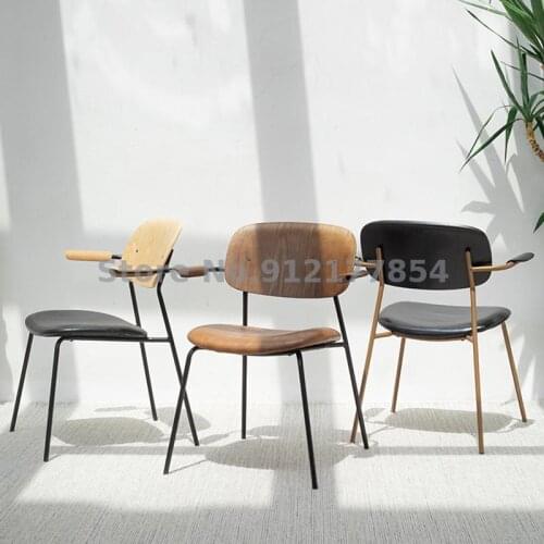 Nordic modern minimalist style net red ins designer solid wood leather soft package adult backrest dining chair seat