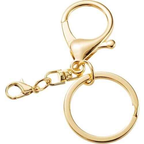 Factory gold key chain small doll with a large number of spot key chain wholesale a large number of goods keychain