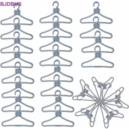 100 PCS /Lot Mini Cute Doll Hangers Gray Plastic Bowknot Clothes Accessories for Barbie Doll 12'' Dress Coat Play House Kids Toy