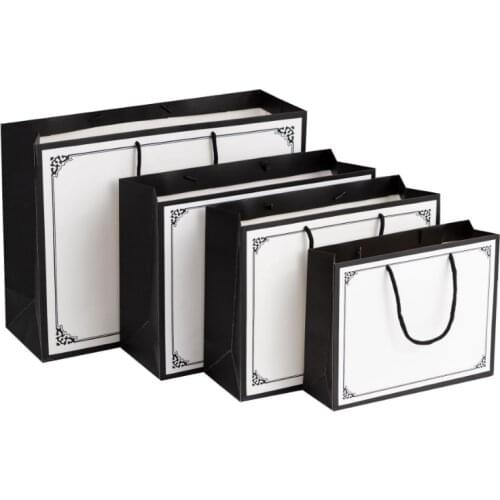 1PCS / LOT 4 size optional with handle, white with black border, multifunctional new boutique shopping bag, gift wrapping