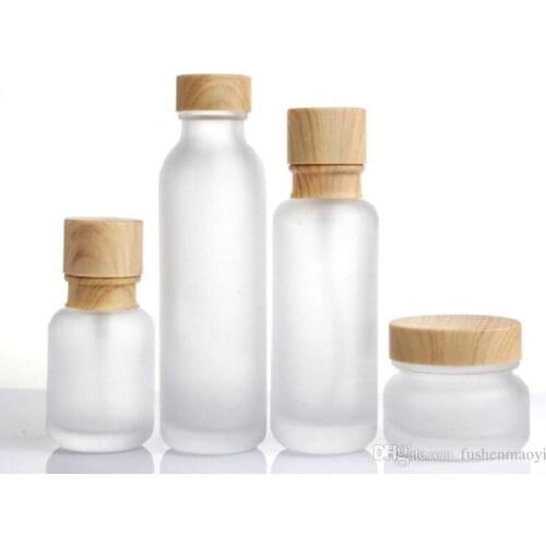Frosted Glass Jar Lotion Cream Bottles Round Cosmetic Jars Hand Face Lotion Pump Bottle with wood grain cap