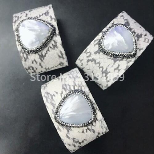 Individual snakeskin bracelet with natural heart-shaped shells for a friends family holiday gift