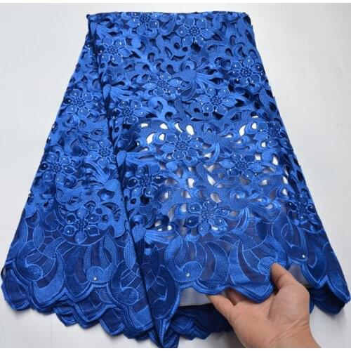 100%cotton Nigerian lace fabric 2021 high quality swiss voile lace fabric handcut holed embroidered african dry lace for wedding