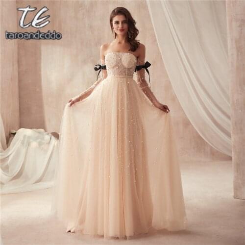 Strapless Champagne Full Pearls Floor Length Long Sleeves Prom Dress Bling Bling Evening Gowns with Black Bow Ties