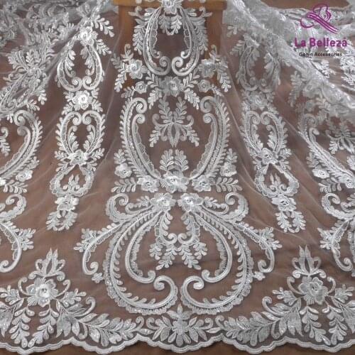 High quality off white polyester with clear sequins wedding dress heavy embroidery lace fabric 1yard