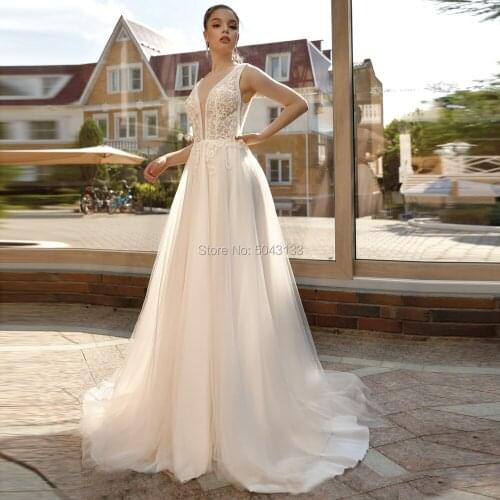 Light Champagne Boho Wedding Dresses 2020 V Neckline Lace Applique Wedding Bride Dress Sleeveless Backless Long Vestidos Noiva