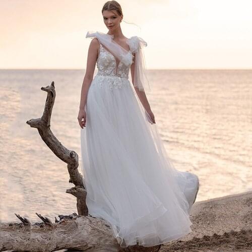 2021 Sexy Deep V-Neck Sleeveless Backless Civil Long Bridal Gown With Bow Sweep Train Boho Summer Beach Wedding Dresses
