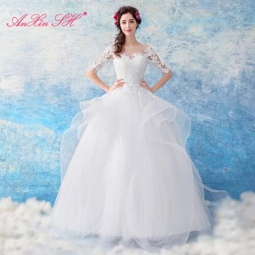 AXJFU European Princess beading flower illusion wedding dress fairy lovely seductive fairy bride white lace wedding dress 1981