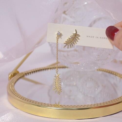 Korean new design fashion jewelry exquisite copper inlaid zircon asymmetric feather earrings elegant womens prom earrings