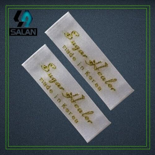 Customized great grade clothing Woven labels by wood shuttle Garment Shirt Shoes Bags selvage sewing Label Embroidered Tag