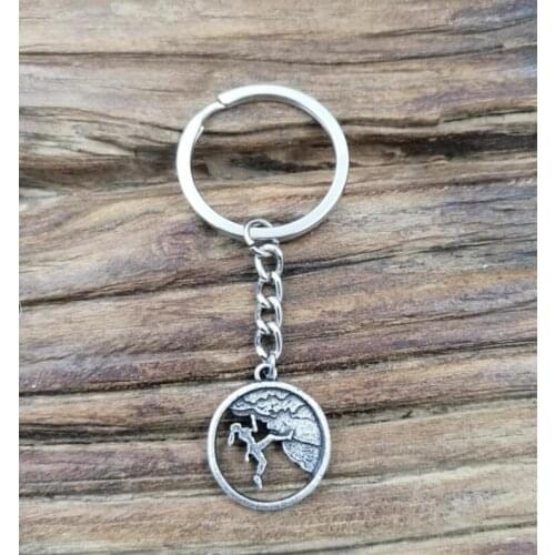 Rock woman climbing keychain
