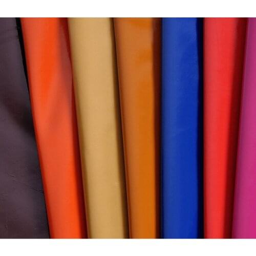 Ultra - thin mirror PU leather/ 0.7mm thick free shipping synthetic leather fabric material for Bags, shoes, belts, clothes