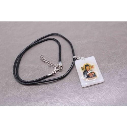 Catholic, glamorous crystal Santa Ana necklace medallion, lobster clasp leather necklace, Jesus Christ leather chain