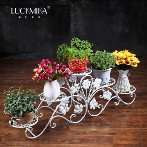 Balcony indoor Nordic flower shelf wrought iron balcony multi-layer floor-standing self-contained simple living room ground flow