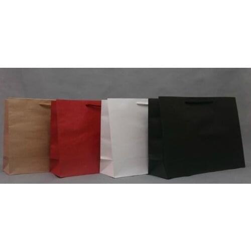 Wholesale Free shipping . 42*31*13 cm Wholesale 4 colors Kraft paper bag100% wood pulp kraft paper 100pieces\ lot