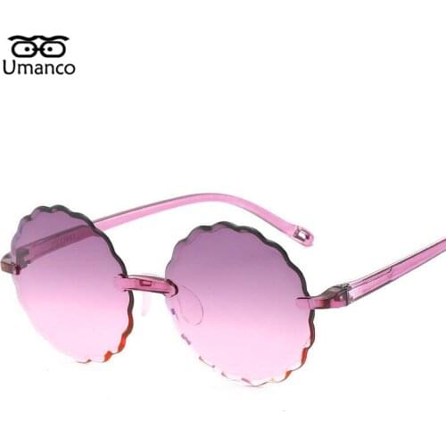 Umanco 2021 New Rimless Round Flower Kids Sunglasses For Children PC Frame Resin Lens Fashion Brand Baby Beach Accessories Gifts