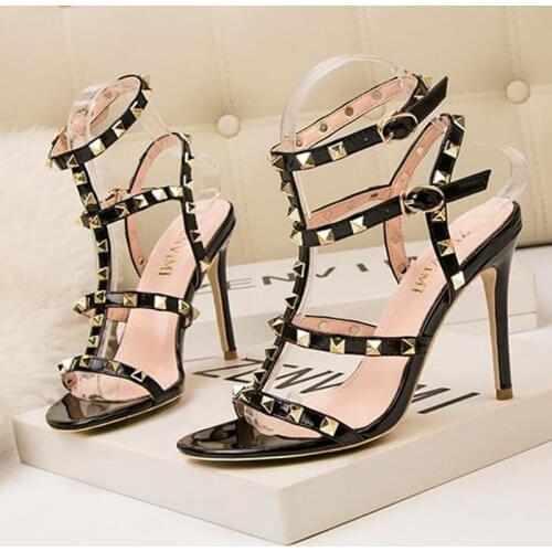 Meriahzheng 10CM Sexy Club High Heel Patent Leather Metal Studs Womens Shoes with Stiletto Hollow Roman Womens Sandals ZWM