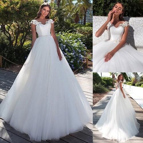 Attractive Tulle Jewel Neckline A-line Wedding Dresses With 3D Lace Appliques Illusion Back White Bridal Dress