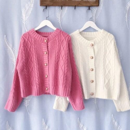 2021 autumn and winter new twist stripe single-breasted knitted sweater solid color round neck cardigan jacket women