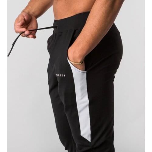 2021 new muscle fitness running training sports cotton trousers mens breathable Slim beam mouth casual health pants