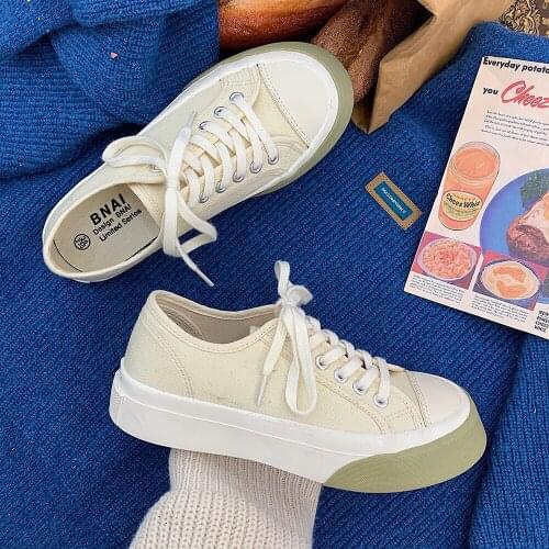 2021 spring new Japanese retro student low-top casual board shoes big toe thick-soled canvas shoes female simple ins tide