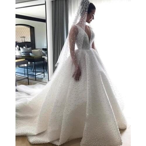 Dubai Africa New Elegant V-Neck Sleeveless Wedding Dresses 2020 Princess Pearls Bridal Gowns Robe De Mariee