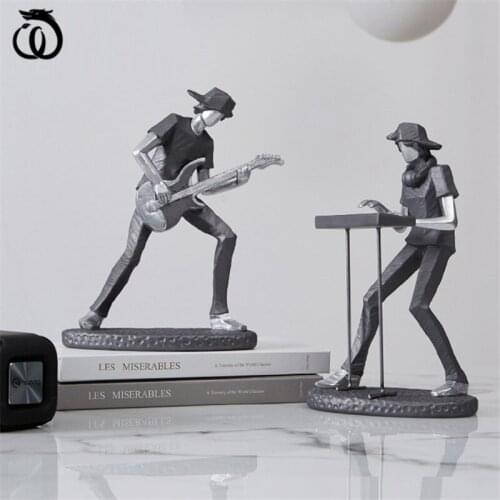 WU CHEN LONG Nordic Abstract Rock Band Arts Sculpture Lucky Guitar Drums Figurine Creative Resin Crafts Home Decoration R6046