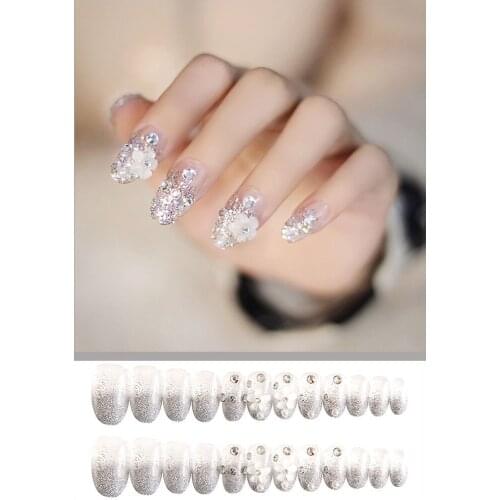 ENDRRFLLA 24pcs White Flowers Silver Glitter Powder False Nails Translucent French Nail Tip Rxtension Wearing Nail Art