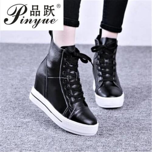 New style four seasons fashionable small white shoe genuine leather inside heighten a round head fastens Woman sneakers