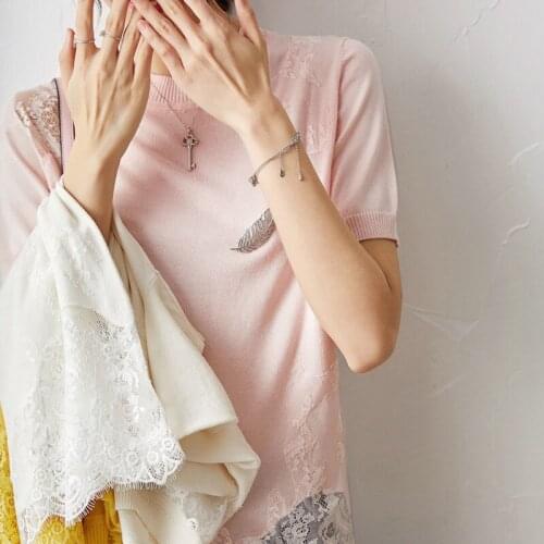 Of New upper garment female 2021 summer splicing spun silk cotton knitted sweater round collar short sleeve blouse