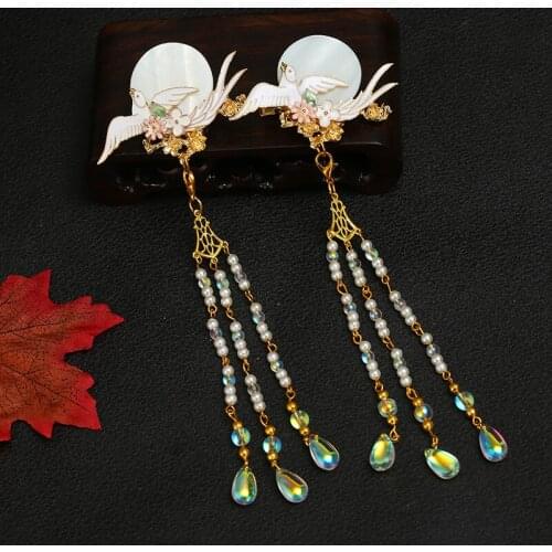 Antique jewelry handmade Chinese clothing headdress hairpin small birds freshwater shellfish fresh bluing tassel step shake