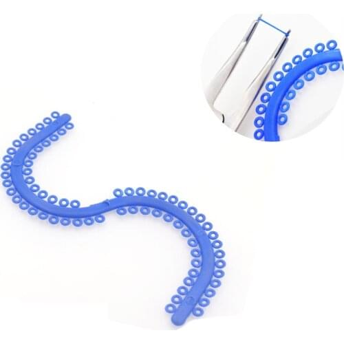 10sticks/bag Dental Separator Ligature Ties Oral Orthodontic Material S shape Blue Color Elastic Separators Circle Rubber Ring