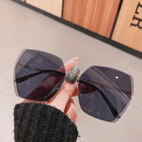 Vintage Luxury Frameless Gradient Alloy Sunglasses 2021 New Trendy Ladies Fashion Super Big Frame Anti-ultraviolet Sun Glasses