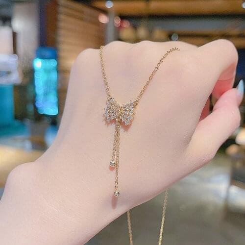 Bow Long tassel Titanium Steel Necklace for Women Design Sensation Hyperflash Zircon Pendant with Clavicle Chain for Women
