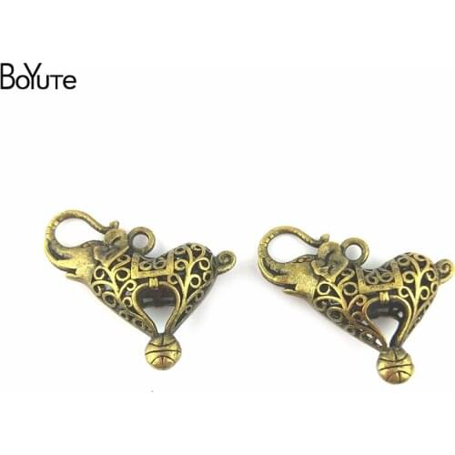 BoYuTe (10 Pieces/Lot) 44*35MM Antique Bronze Plated Alloy Hollow Elephant Charm Pendant for Diy Jewelry Making Handmade Craft